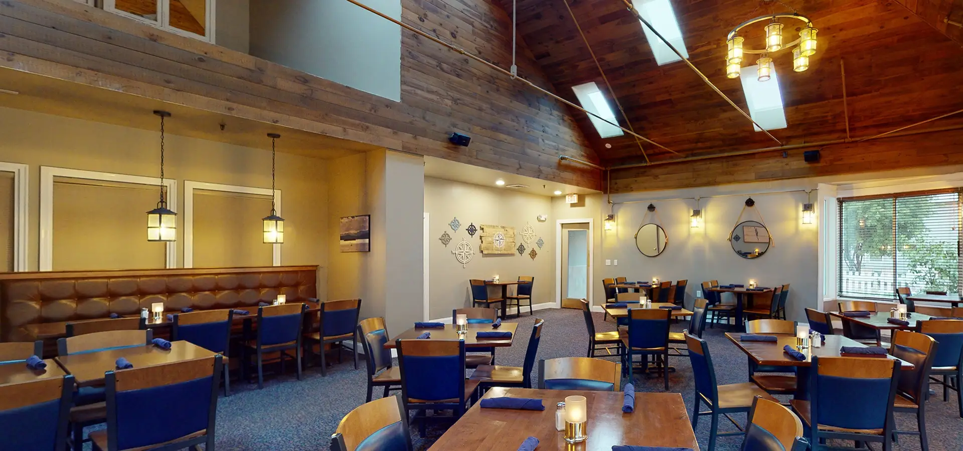 Modern guest room with king bed and warm lighting at Best Western Plus Windjammer Inn & Conference Center